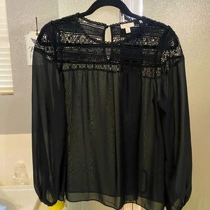 Beautiful, black sheer blouse.